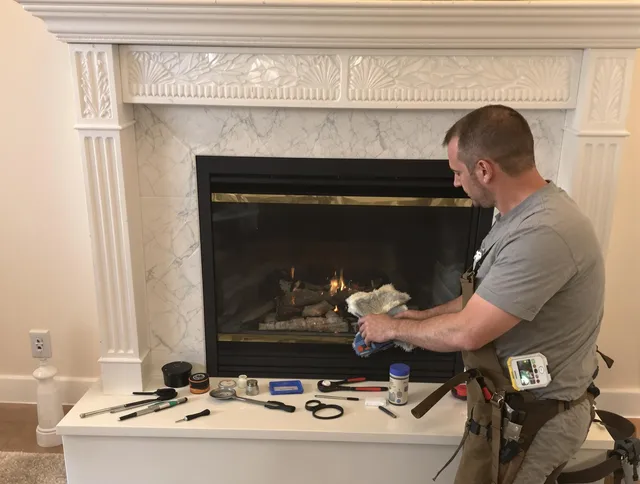 Sagamore Hills Chimney Sweep performing fireplace maintenance in Sagamore Hills, OH